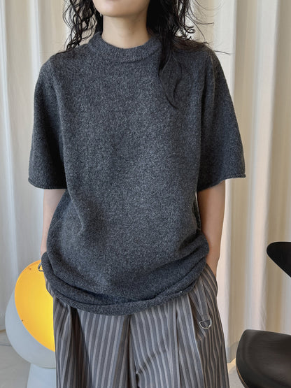 Louvre Early Spring New Korean Style Simple Round Neck Knitted Slightly Curled Sweater Soft and Comfortable Casual Top for Women
